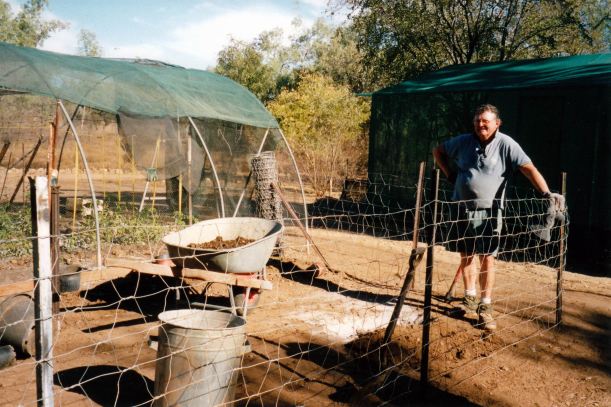 Resize of 07-27-2002 01 John as vegie gardener Adels.jpg