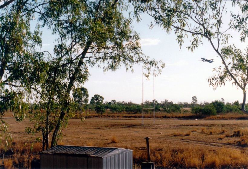 Resize of 08-28-2002 plane leaving as seen from back veranda doom.jpg