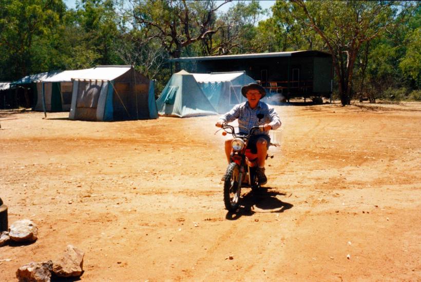 Resize of 08-07-2003 07 John on bike in camp area.jpg