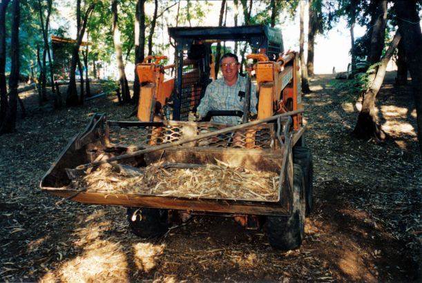 Resize of 06-08-2003 01 john at work in grove.jpg