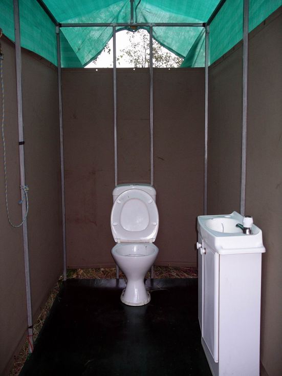 Resize of 04-18-2005 03 Flushing Camp Toilet!.JPG